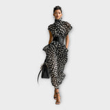 Vestido comprido com estética sofisticada e intemporal